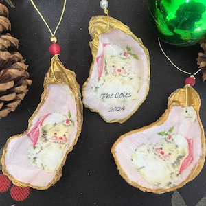 Beautiful pink Santa decoupaged oyster shell ornament, with gilded edges, makes a perfect Christmas gift for anyone, can be personalized