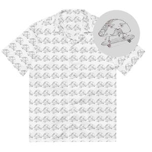 May include: A white short-sleeve button-down shirt featuring an all-over repeating black line drawing pattern of a taco character with a mustache riding a skateboard. The shirt has a classic collar and a front button closure with a centered placket.