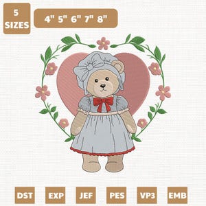 Puede incluir: Diseño bordado de un oso de peluche con gorro y vestido, sobre un corazón rosa y una corona floral. Disponible en 5 tamaños, de 10 cm a 20 cm. Formatos de archivo: DST, EXP, JEF, PES, VP3 y EMB.
