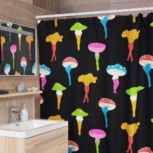 May include: Black shower curtain with a colorful mushroom pattern. The mushrooms have different colored tops and stems, and each mushroom has a pair of legs.