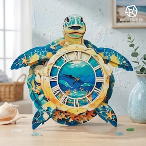 May include: A multi-layered wooden wall clock shaped like a sea turtle. The clock face features Roman numerals and an underwater scene with coral and fish. The turtle shell is decorated with blue and yellow patterns, starfish, and seashells.