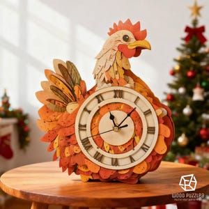 May include: A wooden rooster clock with a detailed design. The clock features a round face with Roman numerals and black hands. The rooster is made of layered wood in shades of orange, yellow, and brown. The clock is on a wooden table.
