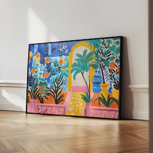 May include: A colourful abstract painting of a garden with a pink archway, blue and green plants, and yellow and orange flowers. The painting is framed in black.