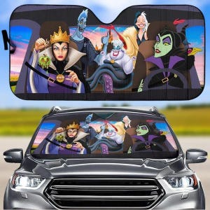 May include: A car sunshade featuring a colorful illustration of Disney villains, including Maleficent, Ursula, and the Evil Queen. The villains are depicted in their iconic poses and costumes.
