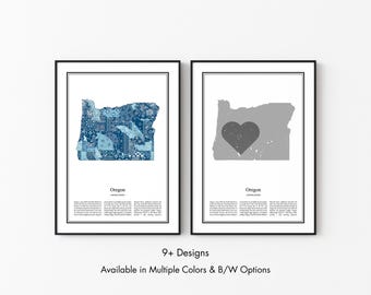 May include: Two framed wall art prints featuring the state of Oregon. The left print shows a blue patterned map of Oregon. The right print displays a grey map of Oregon with a dark heart shape. Both include the text Oregon, United States.