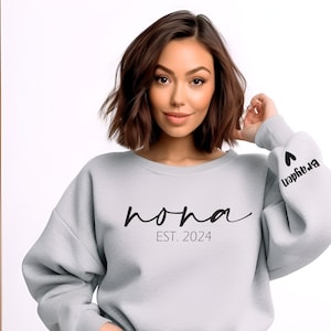 Nona Est. 2024 Sweatshirt - Personalized Crew Neck for New Grandmas, Nona Sweatshirt with Kid Name on Sleeve, Personalized Gift for Nona