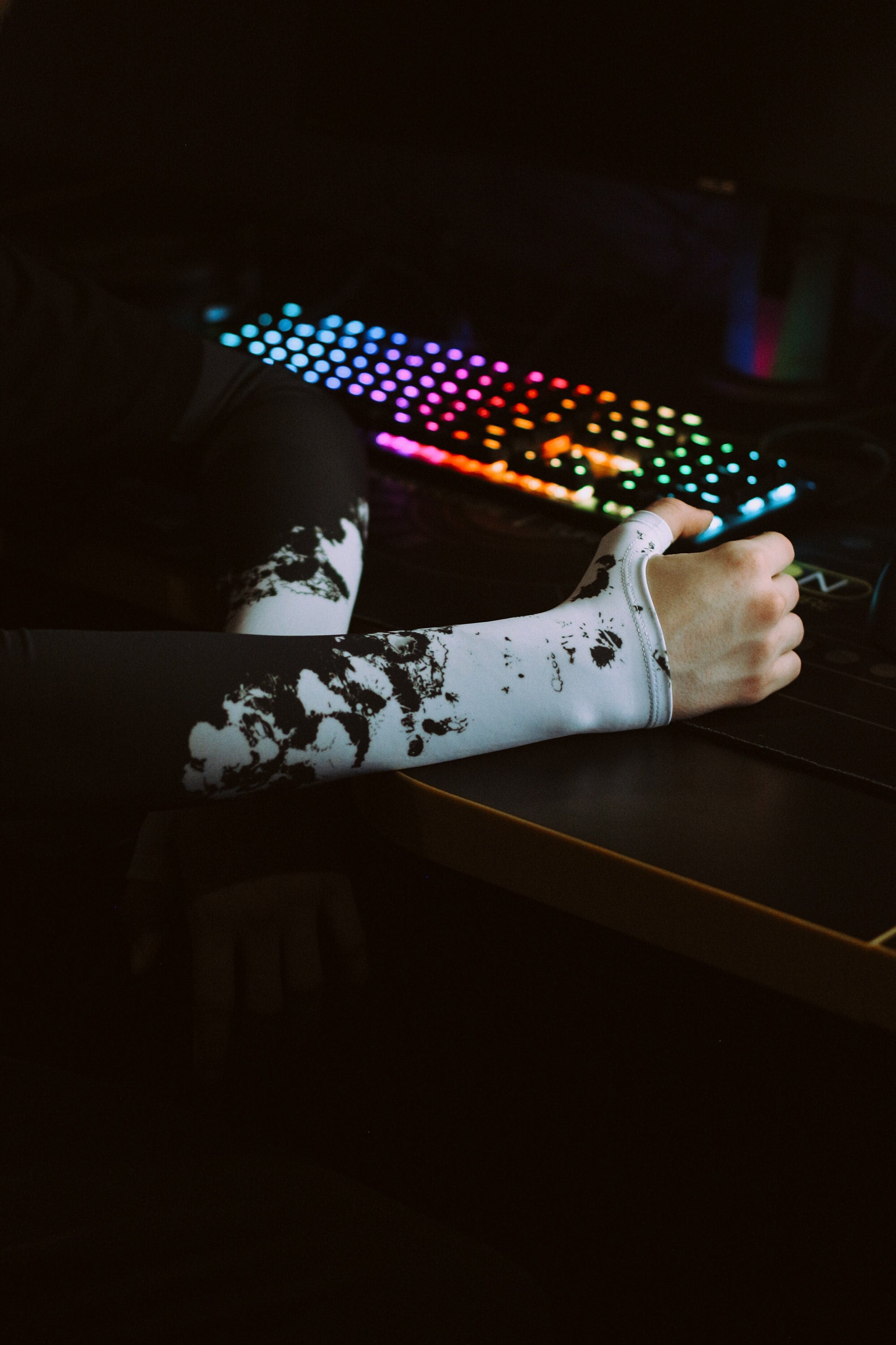 Gaming Arm Sleeve for PC and Sport with open glove and thumb hole for esports gamers Paints Spray