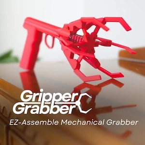 May include: A red plastic mechanical grabber tool with a spring mechanism. The tool is labeled "Gripper Grabber EZ-Assemble Mechanical Grabber".