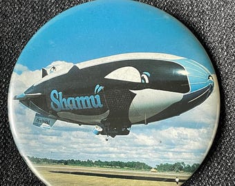 Vintage SeaWorld Shamu speldknop orca jaren 90 themapark memorabilia