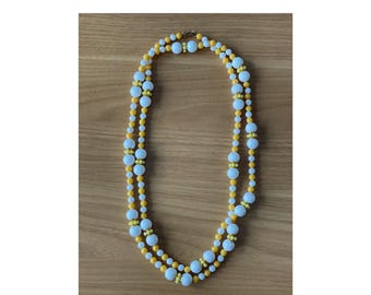 Vintage lange kralenketting witgeel, gelaagd tot operalengte