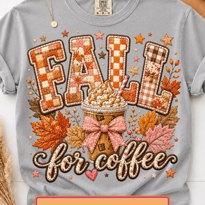 May include: A light gray t-shirt featuring the text FALL in a plaid patchwork pattern and the text for coffee in a cursive font. A central iced coffee cup with whipped cream, a straw, and a pink bow is surrounded by orange and pink autumn leaves.