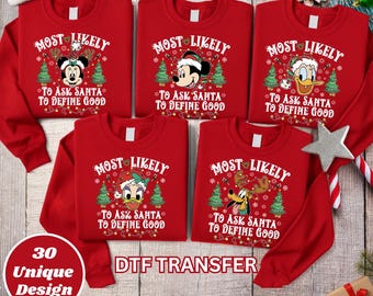 May include: Five red crewneck sweatshirts featuring Disney characters including Minnie Mouse, Mickey Mouse, Donald Duck, Daisy Duck, and Pluto. Each sweatshirt displays the text Most Likely To Ask Santa To Define Good with Christmas trees.