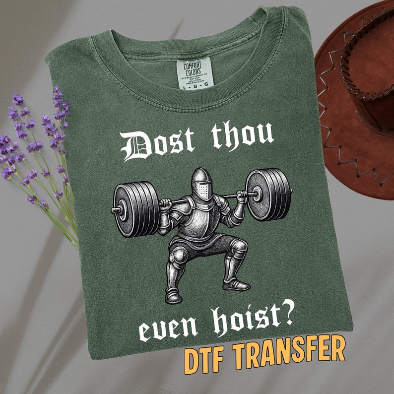 May include: Green t-shirt with the text "Dost thou even hoist?" and a graphic of a knight lifting weights. The shirt also has a DTF TRANSFER label.