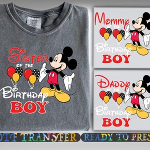 May include: A gray t-shirt and two square prints featuring Mickey Mouse. The t-shirt has the text "Sister of the Birthday Boy" with Mickey Mouse and balloons. The prints say "Mommy of the Birthday Boy" and "Daddy of the Birthday Boy".