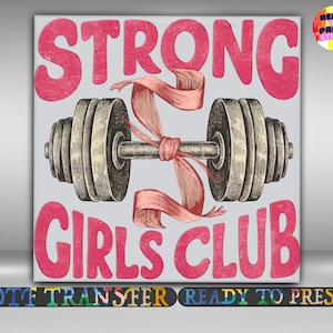 May include: A grey background features a barbell with a pink ribbon tied around the centre. The words "STRONG GIRLS CLUB" are in pink, distressed font. The image has a vintage, hand-drawn style.