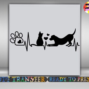 May include: A black graphic design on a light gray background featuring a continuous heartbeat line that incorporates a paw print, a sitting cat, two small hearts, and a dog in a playful stance. The text READY TO PRESS STUDIO is visible.