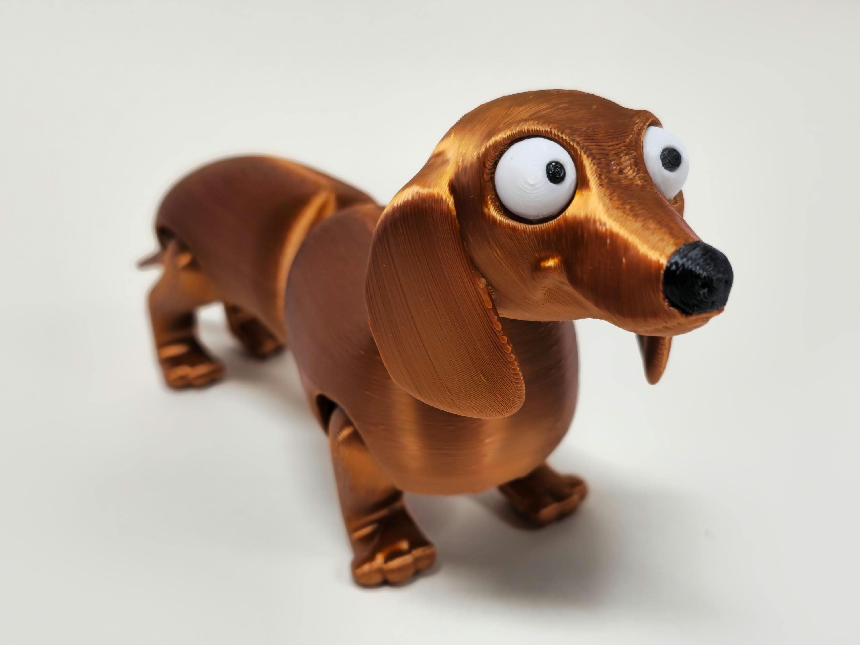 ダックスフンド置物　Running sausage christina uk Flexi Dachshund Fidget - Articulated Sausage Dog Stress Relief Toy