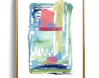 May include: Abstract watercolor art print in a gold frame. The artwork features a rectangular composition with overlapping shapes and brushstrokes in shades of blue, green, pink, and red. The frame is a thin, gold metal.
