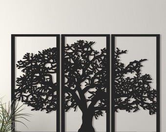 May include: A three-panel wall art piece featuring a black silhouette of a tree. The tree's branches and leaves are intricately detailed against a white background, framed by black borders. The artwork is mounted on a white wall.