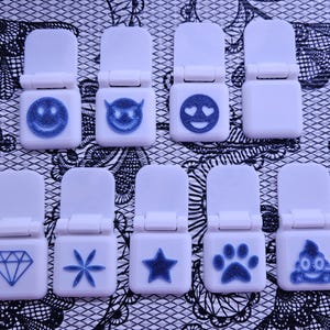 Ljusdynans knappskydd: Roliga designer, förhindrar oavsiktliga avstängningar