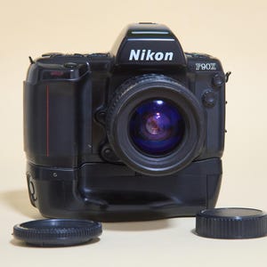 Nikon F90X + MB-10 Battery Grip + Tamron Macro 35-90mm f4-5.6 + Flash Sunpak Power Zoom 4000AF