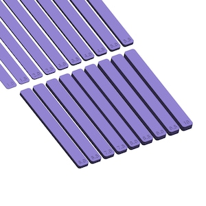 May include: A set of lavender-colored, rectangular measuring sticks with numbers printed on them. The numbers range from 1.0 to 10, with increments of 0.5. The sticks are arranged in a diagonal pattern against a white background.