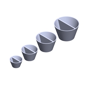 Pode incluir: Conjunto de quatro tigelas divididas de cerâmica cinza, cada uma com um tamanho diferente. As tigelas estão dispostas em uma fila da maior para a menor.