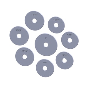 Puede incluir: Un conjunto de ocho arandelas metálicas grises de diferentes tamaños, cada una con un agujero central. Las medidas se indican en pulgadas: 3/4", 33/64", 1", 9/16", 19/32", 5/8", 11/16" y 23/32".