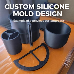 May include: Black custom silicone mold designs. The image shows several examples of custom molds, including a cylindrical shape with internal supports, a cup-like mold, and a semi-circular design. Text on the image reads "CUSTOM SILICONE MOLD DESIGN" and "Example of a previous custom project."