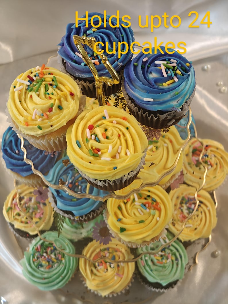Our Large 3tiered dessert stand holds up to 24 medium sized cupcakes & XL stand holds up to more than 30 cupcakes.