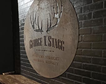 Letrero de pared de George T. Stagg de 42"