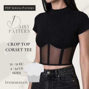 Könnte beinhalten: Schwarzes Crop-Top-Korsett-T-Shirt mit transparentem Mesh-Einsatz. Das Bild enthält den Text "PDF Sewing Pattern", "Daisy Pattern", "Crop Top Corset Tee" und Größenangaben in US- und EU-Größen. Der Schwierigkeitsgrad ist mit "Intermediate" angegeben.