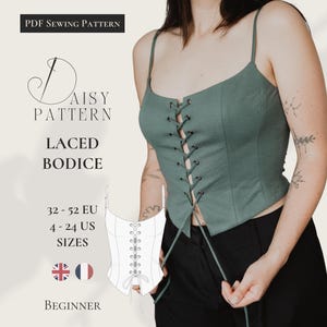 May include: A sage green laced bodice with thin spaghetti straps and a front lace-up closure featuring metal eyelets. The image includes text: PDF Sewing Pattern, Daisy Pattern, Laced Bodice, 32-52 EU, 4-24 US Sizes, Beginner, and a technical line drawing.