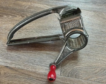 French vintage cheese grater with red handle