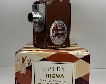 Bell and Howell/canon 45 Mm Camera With Original Leather Case