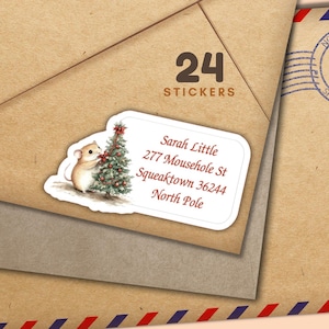 May include: A sheet of 24 stickers with a festive Christmas design. Each sticker shows a watercolour illustration of a mouse decorating a Christmas tree. The stickers have a white border and include a name and address.