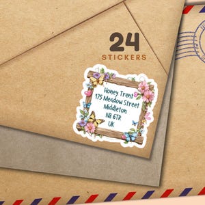 May include: A sheet of 24 stickers with a floral and butterfly design. The stickers have a wooden frame with the text "Honey Trent, 175 Meadow Street, Middleton, N8 6TR, UK". The stickers are on a brown envelope.