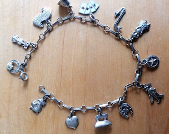 Pulsera con dijes de plata con 13 colgantes, para amantes de la música, años 50