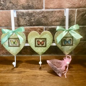 Over door hooks, shabby chic decoupage coat hooks, clothes storage, three heart hooks butterfly vintage themed decoupage
