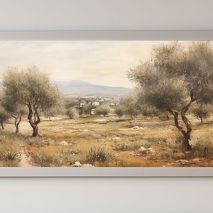 Puede incluir: Pintura enmarcada de un paisaje de olivos. La obra representa olivos en un campo, con un pueblo al fondo. La paleta de colores es apagada con tonos terrosos.