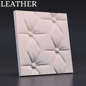 May include: White wall panel with a tufted design. The panel has a square shape and features a repeating pattern of six-pointed stars with a button in the center of each star.