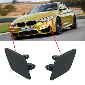 Peut inclure: Deux caches noirs pour lave-phares de voiture. Les caches sont présentés sur un fond de voiture de sport jaune sur un circuit. Les caches sont en plastique noir mat et ont une forme incurvée et aérodynamique.