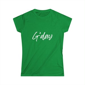 May include: A green t-shirt with the text "G'day" in white lettering.