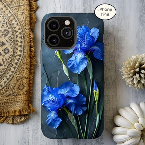 May include: A phone case with a design of blue iris flowers on a dark gray background. The case is compatible with iPhone 11-16.