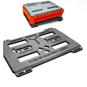 May include: Two-piece set of custom tools. The top piece is a gray and orange toolbox with the text "TOOLS". The bottom piece is a gray metal plate with cutouts and the text "RISK OF ELECTRIC SHOCK" and "custom".