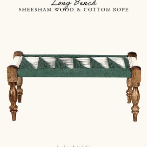 May include: A long bench made of sheesham wood and cotton rope. The bench has a woven green and white seat, supported by four carved wooden legs. The text "Long Bench" and "hand made in India" are visible.