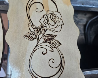 Infinity symbol with rose