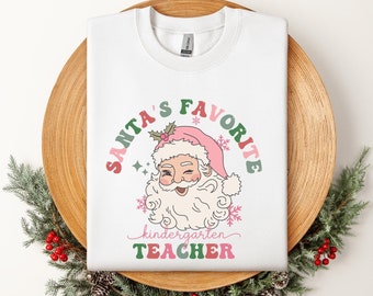 custom christmas teacher sweatshirt retro pink santa festive merry christmas sweatshirt