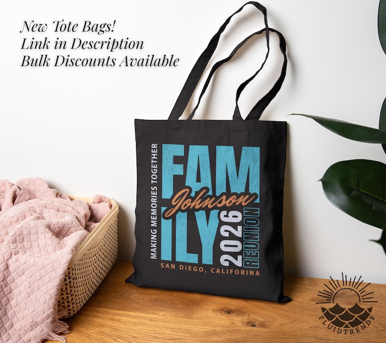 May include: Black tote bag featuring the text "FAM Johnson ILY 2026 REUNION" in teal and orange. The bag also displays "MAKING MEMORIES TOGETHER" and "SAN DIEGO, CALIFORNIA". It has black handles and the text "New Tote Bags! Link in Description Bulk Discounts Available".