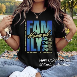 May include: Black t-shirt featuring a blue and green gradient "FAMILY" design. The text includes "Howard 2026 Reunion" and "Anaheim, California". Additional text at the bottom says "More Color Options & Custom Wording".
